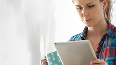 Woman looking at her moblle device 