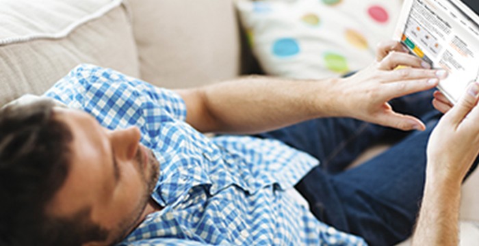 Man looking at information on his mobile device
